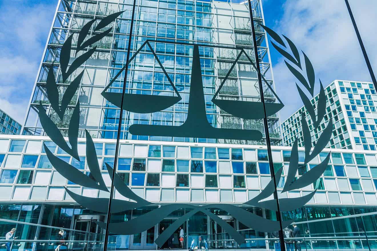 The logo of the International Criminal Court at the entrance in front of the building in The Hague, Netherlands. Credit: oliverdelahaye/Shuttertstock.