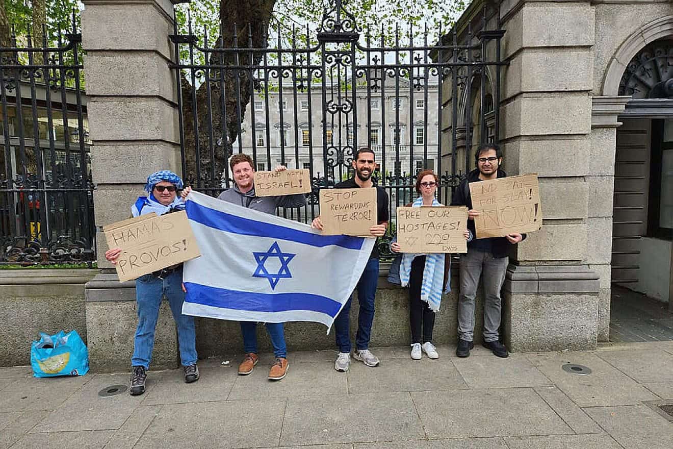 Lior Tevet (second from right) and friends protest against a pro-Palestinian rally in Ireland. Credit: Courtesy.