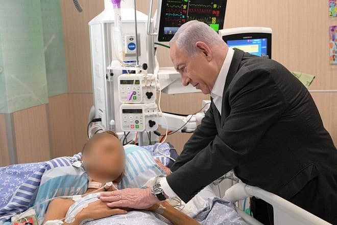 Israeli Prime Minister Benjamin Netanyahu visits wounded IDF soldiers at the Sheba Medical Center in Ramat Gan, May 14, 2024. Photo by Amos Ben-Gershom/GPO.