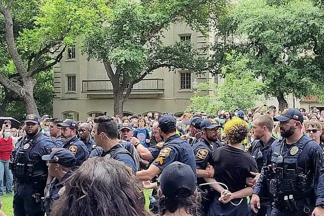 Police arrest pro-Palestinian demonstrators associated with an anti-Israel student encampment at the University of Texas at Austin, on April 24, 2024. Credit: Wikimedia Commons.