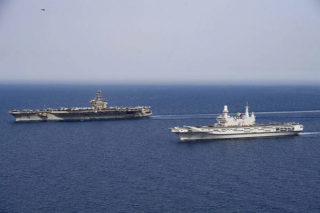 The Nimitz-class aircraft carrier “USS Dwight D. Eisenhower” (CVN 69) and the Italian aircraft carrier ITS Cavour (CVH 550) steam in formation in the Red Sea, June 7. Credit: U.S. Navy Photo.