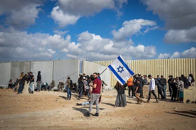 People protest against aid trucks entering the Gaza Strip at the Kerem Shalom crossing in southern Israel, Feb. 22, 2024. Credit: Erik Marmor/Flash90.