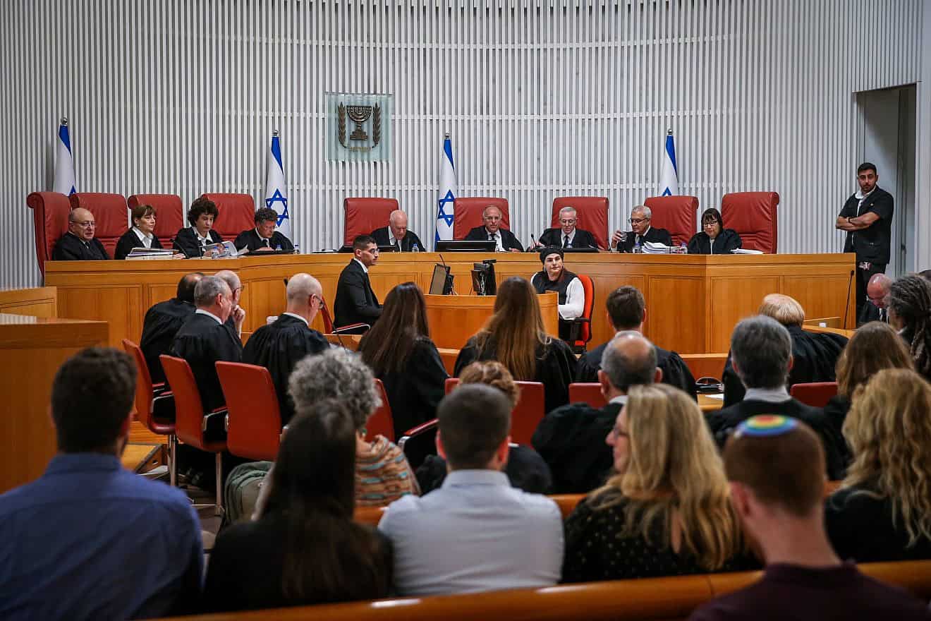 Supreme Court justices arrive for a court hearing on the government's drafting of orthodox Jewish religious studies students for the military, at the Supreme Court in Jerusalem on June 2, 2024. Photo by Amit Shabi/POOL.