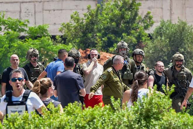 Rescued hostages Andrey Kozlov, Almog Meir Jan and Shlomi Ziv arrive at Sheba Medical Center in Ramat Gan, June 8, 2024. Photo by Avshalom Sassoni/Flash90.