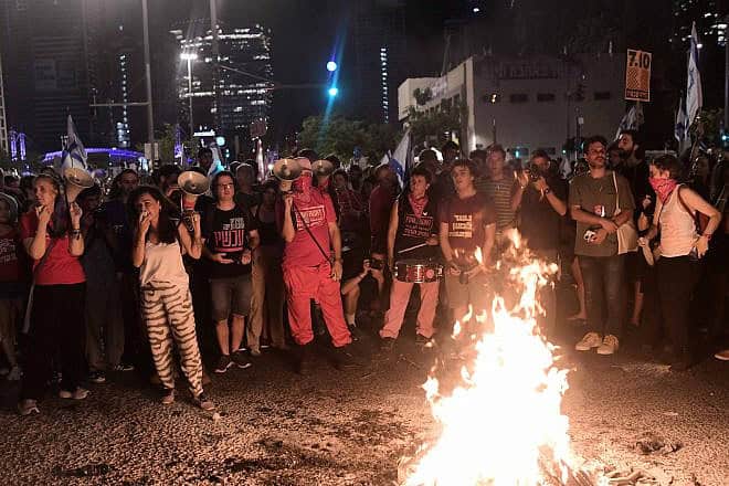 Protesters call for the release of Israeli hostages held in the Gaza Strip and the resignation of the Israeli government, outside the Kirya military headquarters in Tel Aviv, June 15, 2024. Photo by Tomer Neuberg/Flash90.