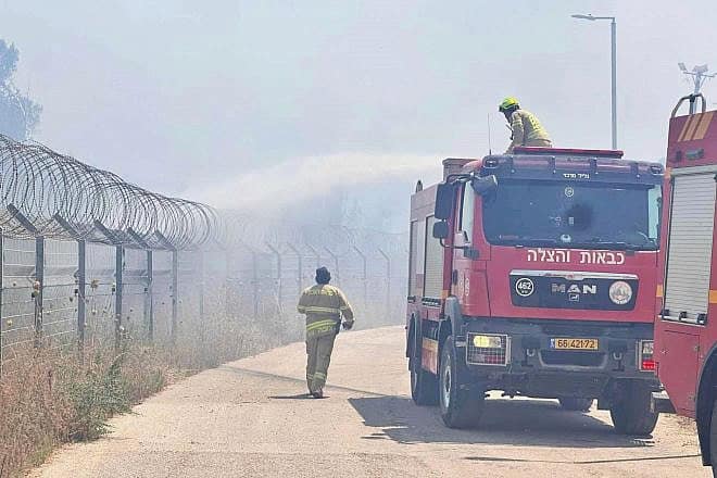 Firefighters in Israel's north extinguish a border blaze. Credit: Courtesy of the Israel Fire and Rescue Authority.