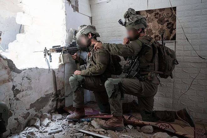 Israeli troops during operational activity in the Gaza Strip on June 14, 2024. Credit: IDF.
