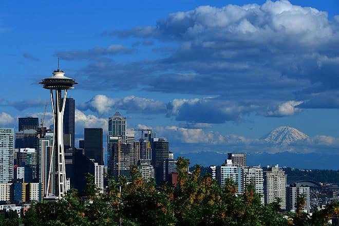 A general view of the Seattle Space Needle and downtown skyline with Mount Rainier in the background, June 8, 2019. Photo by Donald Miralle/Getty Images.