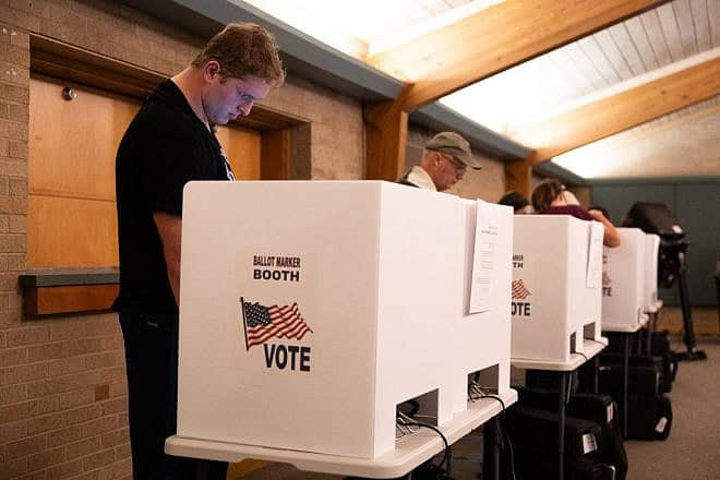 Voters fill out their ballots on Election Day in Columbus, Ohio, on Nov. 7, 2023. Credit: Megan Zelinger/AFP via Getty Images.
