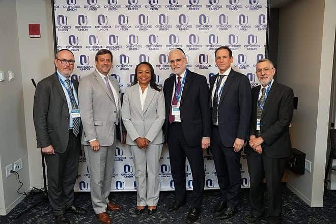 (From left) OU president Mitchel Aeder; OU Advocacy Center executive director of Public Policy Nathan Diament; U.S. Assistant Attorney General Kristen Clarke; OU executive vice president Rabbi Moshe Hauer; OU executive vice president and COO Rabbi Dr. Josh Joseph, and OU Kosher CEO Rabbi Menachem Genack. Credit: Courtesy.