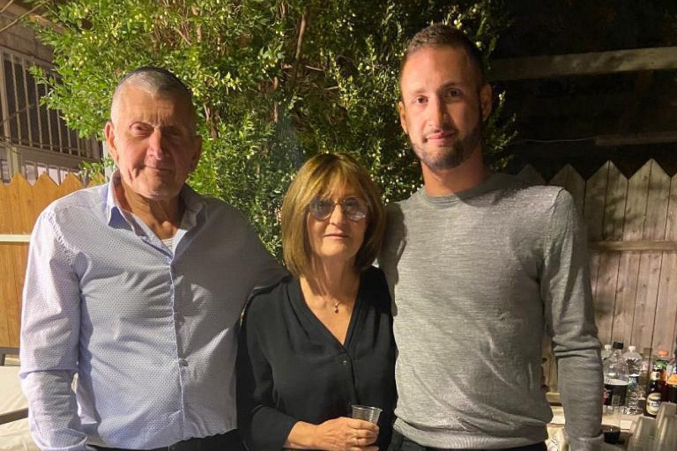 From left: Lucien and Marlene Elmkayes, with their son Binyamin, who was killed in action in Gaza on Nov. 8, 2023, at age 29. Credit: Courtesy.