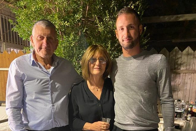 From left: Lucien and Marlene Elmkayes, with their son Binyamin, who was killed in action in Gaza on Nov. 8, 2023, at age 29. Credit: Courtesy.