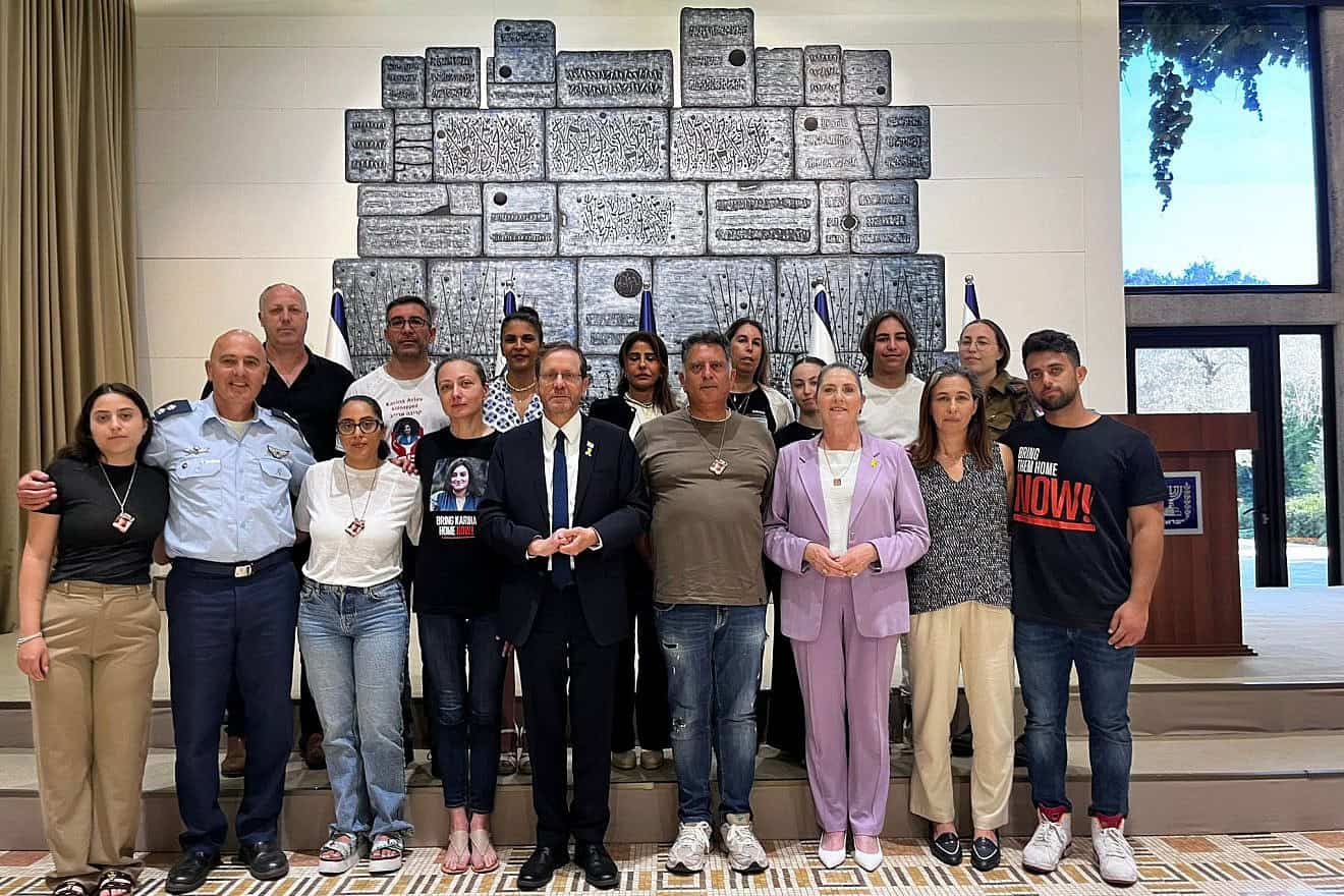 Israeli President Isaac Herzog hosts the families of five female IDF soldiers who were kidnapped on Oct. 7 from the Field Observers base in Nahal Oz by Hamas, June 4, 2024. Credit: Courtesy.