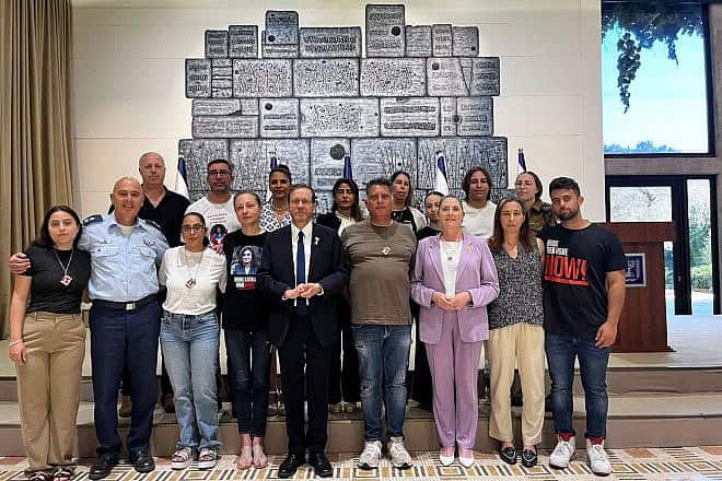 Israeli President Isaac Herzog hosts the families of five female IDF soldiers who were kidnapped on Oct. 7 from the Field Observers base in Nahal Oz by Hamas, June 4, 2024. Credit: Courtesy.