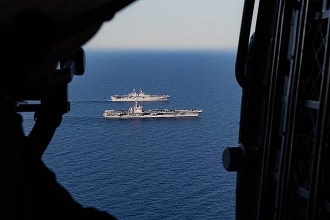 The aircraft carrier “USS Dwight D. Eisenhower” and the amphibious assault ship “USS Wasp” steam in formation in the Mediterranean Sea, June 30, 2024. Credit: Mass Communication Specialist 2nd Class Merissa Daley/U.S. Navy Photo.
