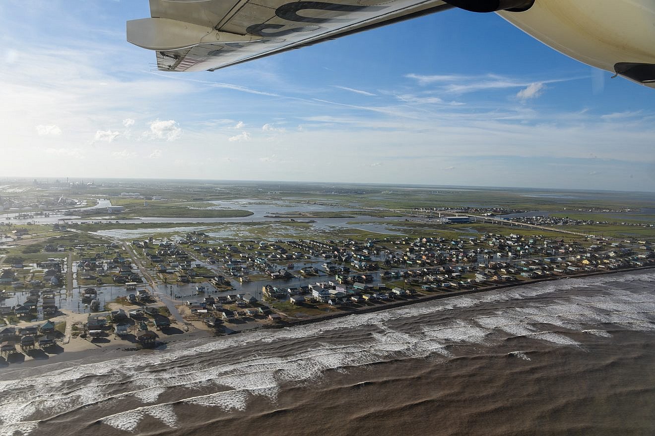 A Coast Guard aircrew conducts flyovers in Texas to assess the damage left behind by Hurricane Beryl in Matagorda, Texas City, Galveston and Houston, July 8, 2024. Credit: Petty Officer 2nd Class Jessica Fontenette/U.S. Coast Guard Photo.