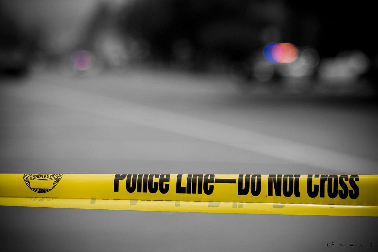 Police tape. Credit: Kaje/Creative Commons.