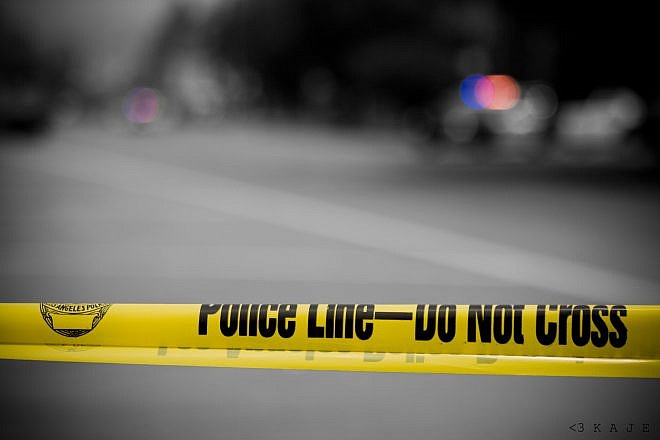 Police tape. Credit: Kaje/Creative Commons.