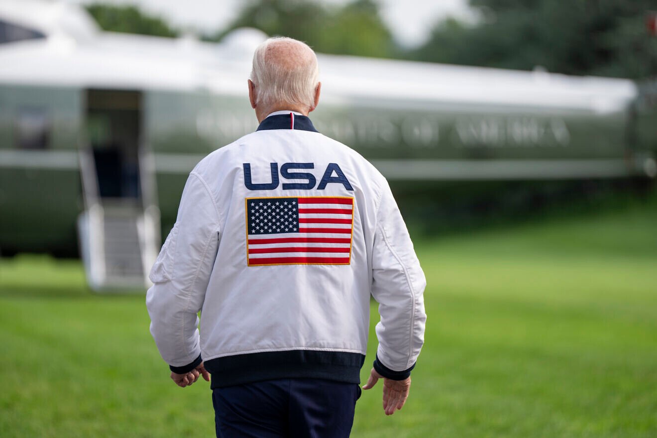 U.S. President Joe Biden wears a Team USA jacket before boarding Marine One en route to Camp David on July 26, 2024. Photo by Adam Schultz/White House.