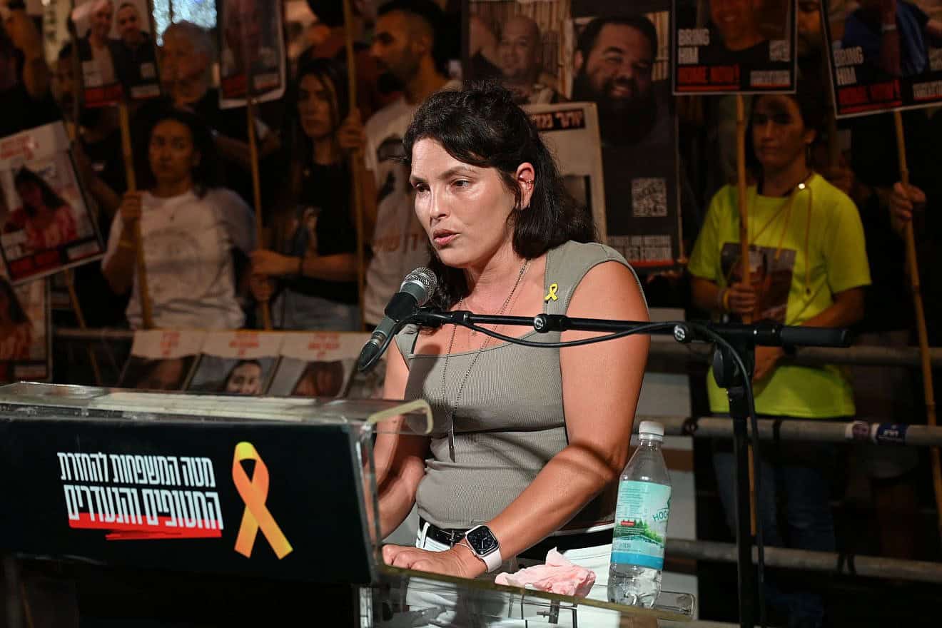 Former Hamas captive Amit Soussana speaks at the weekly Saturday night rally in Tel Aviv's "Hostage Square," July 13, 2024. Photo by Paulina Patimer.