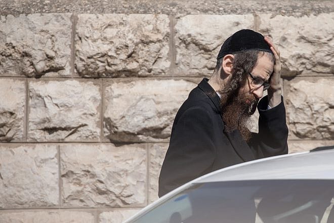 Eliezer Rumpler, from the Lev Tahor cult, arrives at Jerusalem District Court for a court hearing on June 28, 2020. Photo by Yonatan Sindel/Flash90 .