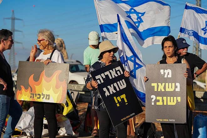 Demonstrators protest against the Israeli government at the Amiad Junction, north of the Sea of Galilee, July 6, 2024. Photo by Ayal Margolin/Flash90.