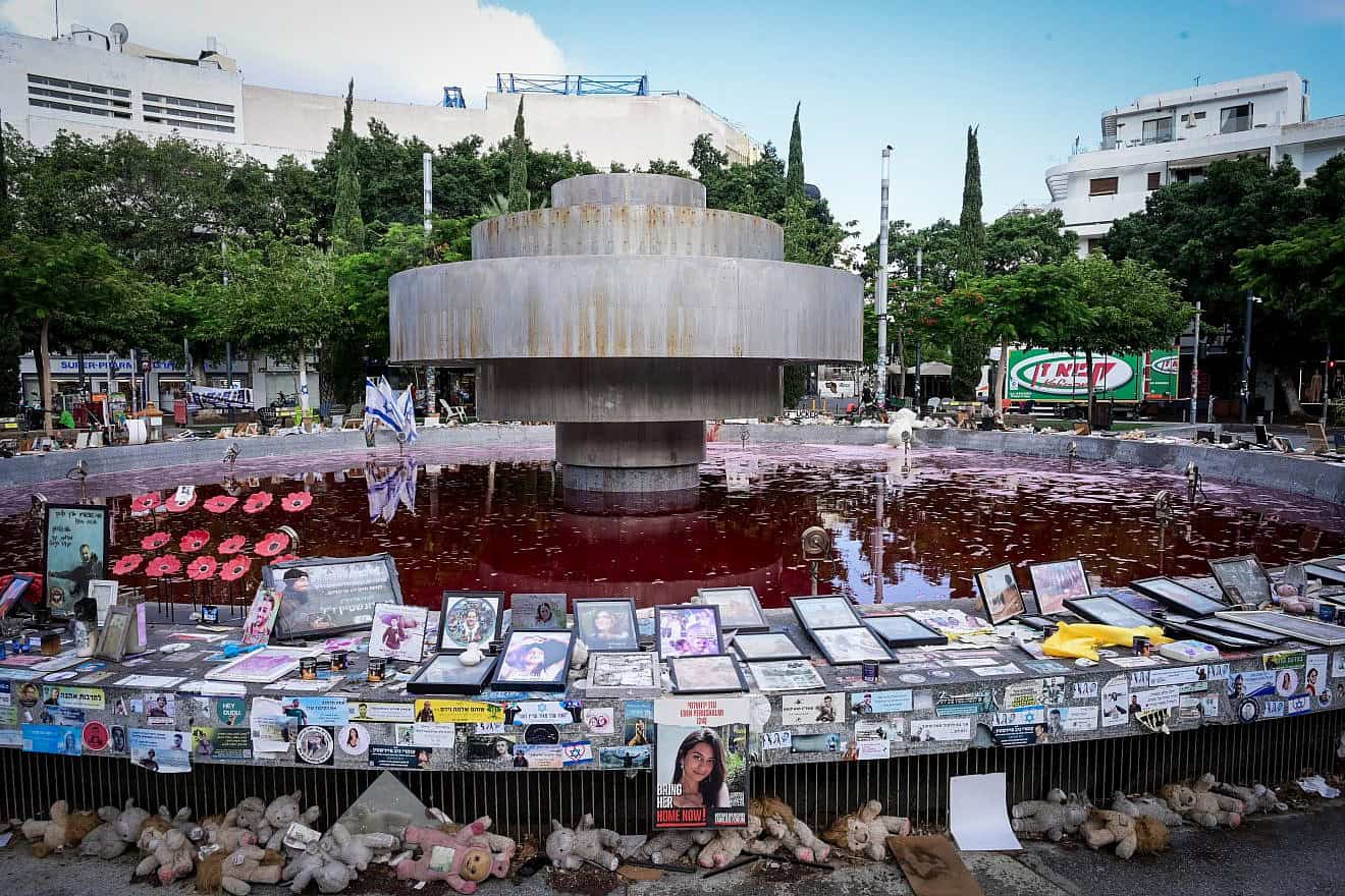 View of the Dizengoff square fountain which was colored red overnight, as a protest for the release of Israelis held kidnapped by Hamas terrorists in Gaza, July 14, 2024. Photo by Avshalom Sassoni/Flash90.