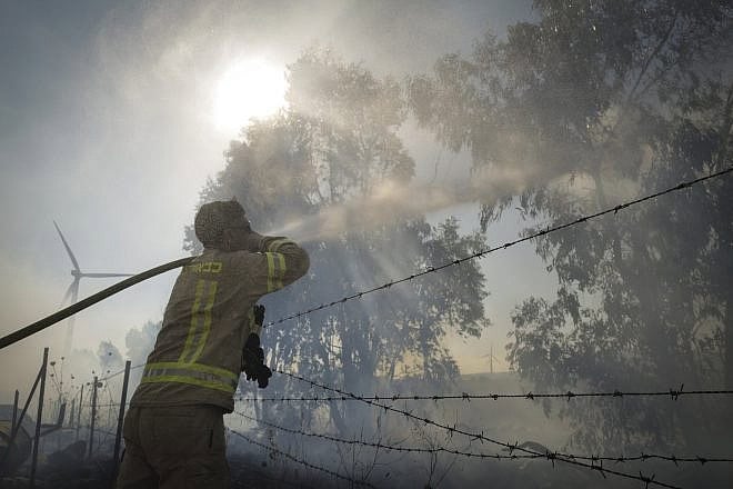 Firefighters work to extinguish wildfires following a missile attack from Lebanon in the Golan Heights, July 20, 2024. Photo by Michael Giladi/Flash90.