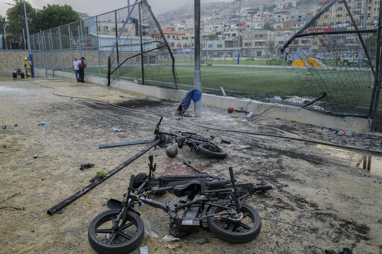 Israeli rescue forces seen at the site of a Hezbollah missile attack in the Druze village of Majdal Shams, July 27, 2024. Photo by Michael Giladi/Flash90.