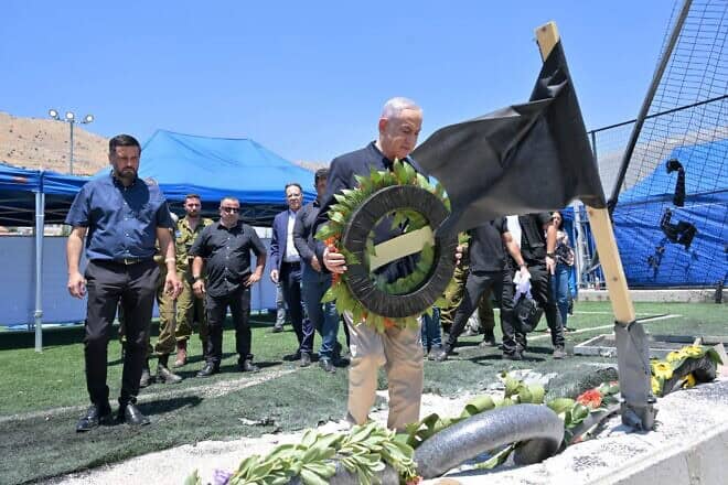 Israeli Prime Minister Benjamin Netanyahu lays a wreath at the site of a deadly Hezbollah rocket attack in Majdal Shams in the Golan Heights, July 29, 2024. Photo by Kobi Gideon/GPO.