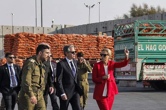 U.S. Secretary of State Antony Blinken (center) walks with Israeli Defense Minister Yoav Gallant (center-left behind) and U.N. Senior Humanitarian and Reconstruction Coordinator for Gaza Sigrid Kaag (right) at the Kerem Shalom border crossing with the Gaza Strip in southern Israel on May 1, 2024. Photo by Evelyn Hockstein/POOL/AFP via Getty Images.