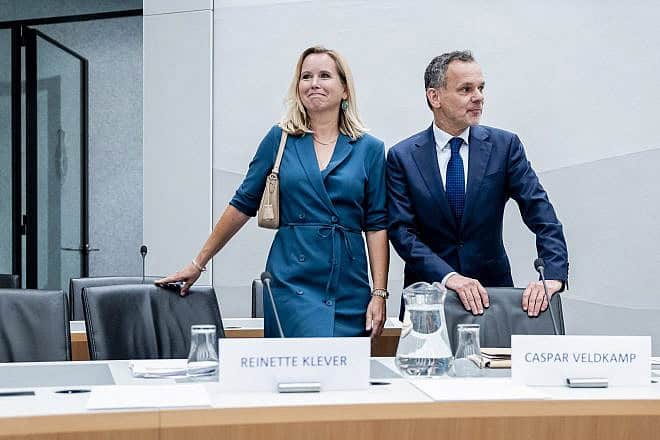 The Netherlands' minister responsible for foreign trade and development aid, Reinette Klever, and Foreign Minister Caspar Veldkamp take part in a hearing in the House of Representatives in The Hague, June 21, 2024. Photo by Remko De Waal/ANP/AFP via Getty Images.