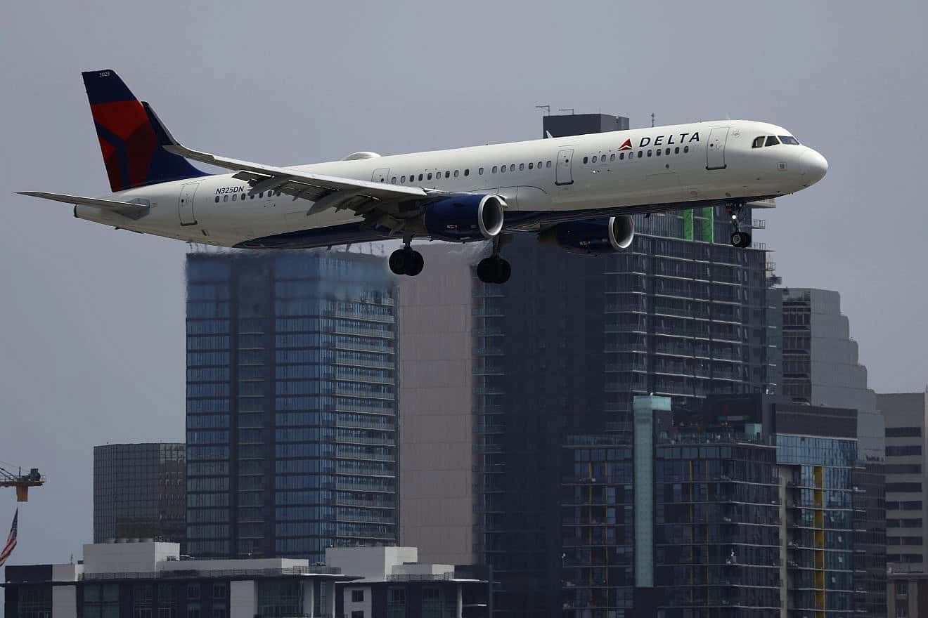 A Delta Airlines Airbus A321-211 aircraft approaches San Diego International Airport for a landing from Atlanta on June 28, 2024 in San Diego. Photo by Kevin Carter/Getty Images.