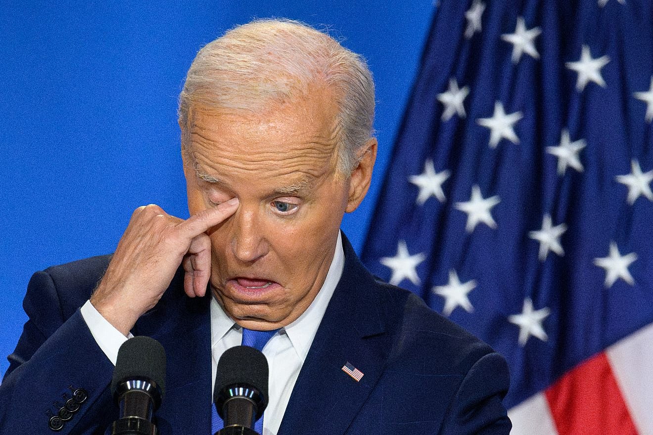 U.S. President Joe Biden wipes his eye as he speaks during a press conference at the close of the 75th NATO Summit at the Walter E. Washington Convention Center in Washington, D.C., on July 11, 2024. Photo by Mandel Ngan/AFP via Getty Images.