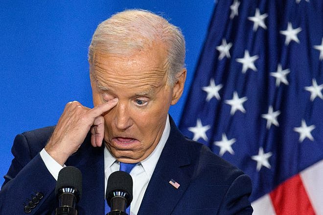 U.S. President Joe Biden wipes his eye as he speaks during a press conference at the close of the 75th NATO Summit at the Walter E. Washington Convention Center in Washington, D.C., on July 11, 2024. Photo by Mandel Ngan/AFP via Getty Images.