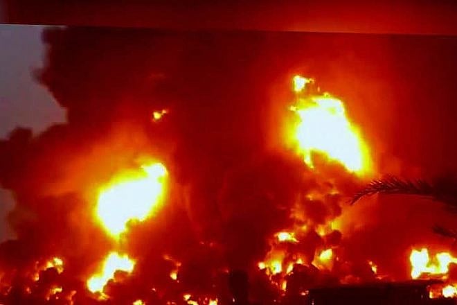 Fire rises after airstrikes carried out by Israeli warplanes targeting oil storage facilities in the port city of Al-Hudaydah, Yemen, on July 20, 2024. Source: Handout/Houthi Media Center via Getty Images.