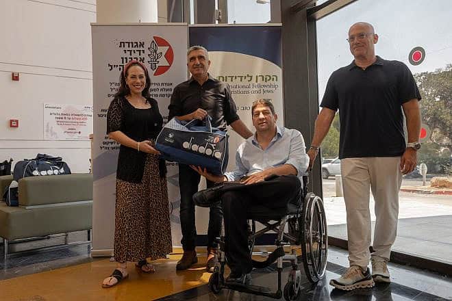 From left: Yael Eckstein, president of the IFCJ, Safwan Marich, director of the IFJC’s Safety and Emergency Response Division, Edan Kleiman, chairman of the Zahal Disabled Veterans Organization, and Adi Strauss, chair of the Friends of the IDF Disabled Veterans Organization. Photo by Chen Schimmel.