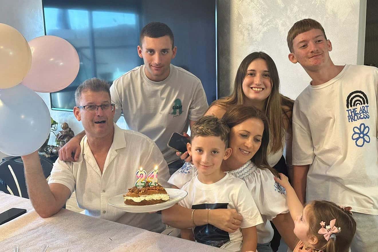 Matan Angrest (rear left) with his parents, sister Adi, 18, and brothers Roi, 9, and Ofir, 16. Credit: Courtesy of the Hostages and Missing Families Forum.