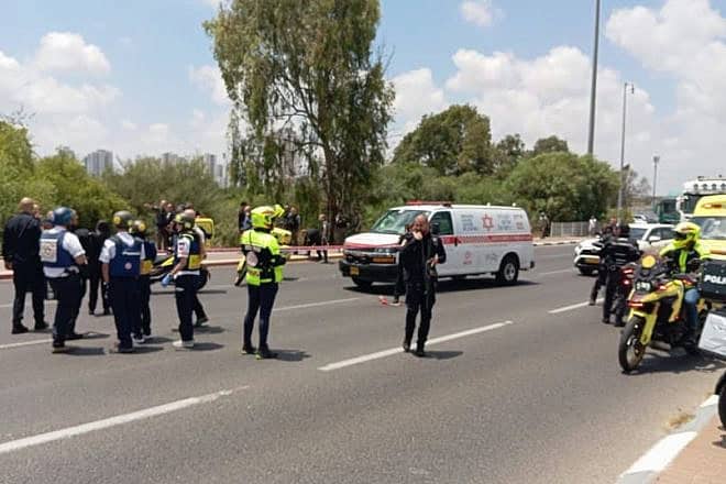 First responders at the scene of a car ramming near Lod, July 14, 2024. Credit: Magen David Adom.
