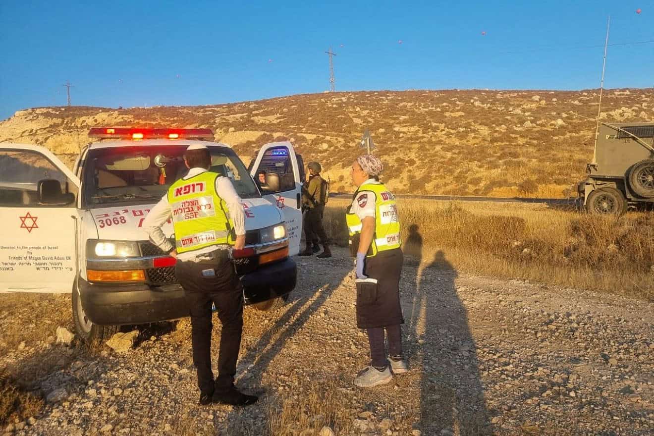 First responders at the scene of a car-ramming attack near Asael in the South Hebron Hills of Judea, July 3, 2024. Credit: Courtesy of United Hatzalah Judea and Samaria.