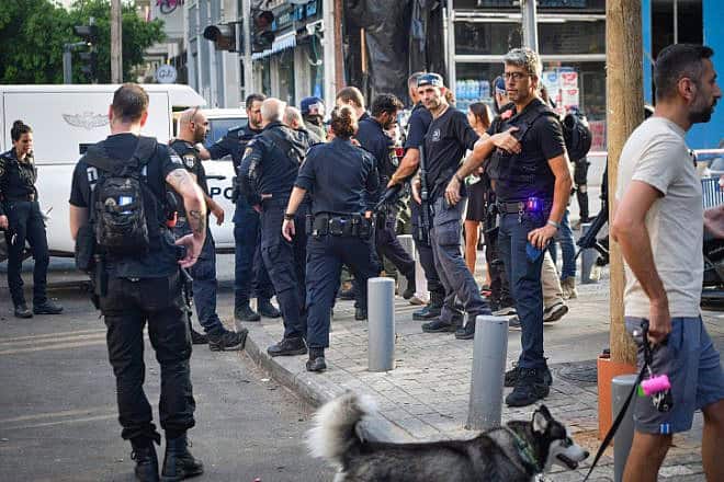 Security personnel at the scene of a drone explosion in Tel Aviv on July 19, 2024. Photo by Avshalom Sassoni/Flash90.