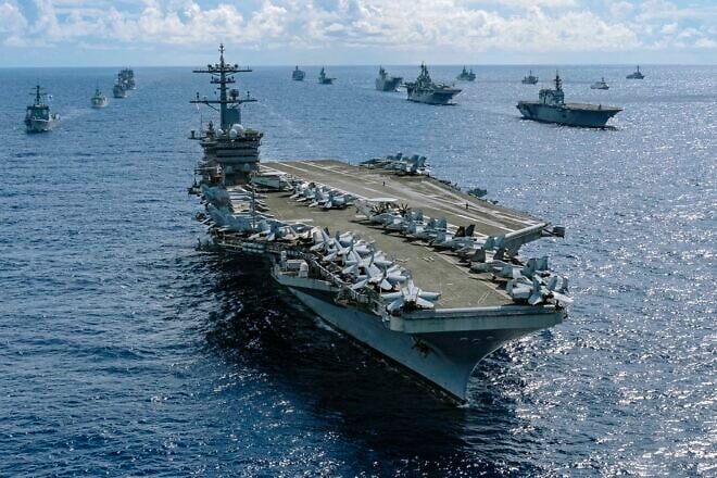The “USS Abraham Lincoln” sails in formation with other vessels in the Pacific Ocean, July 28, 2022, in support of Rim of the Pacific, the world’s largest international maritime exercise. Credit: Canadian Armed Forces Cpl. Djalma Vuong-De Ramos, via U.S. Department of Defense.