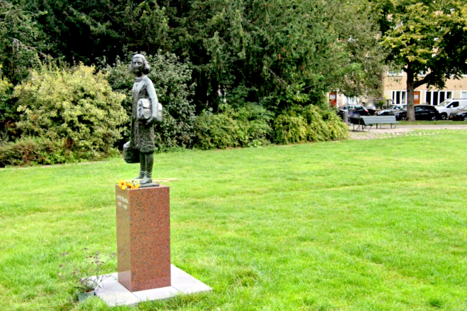 A sculpture of Anne Frank in Merwedeplein in Amsterdam's Rivierenbuurt neighborhood. Source: Google Street View.