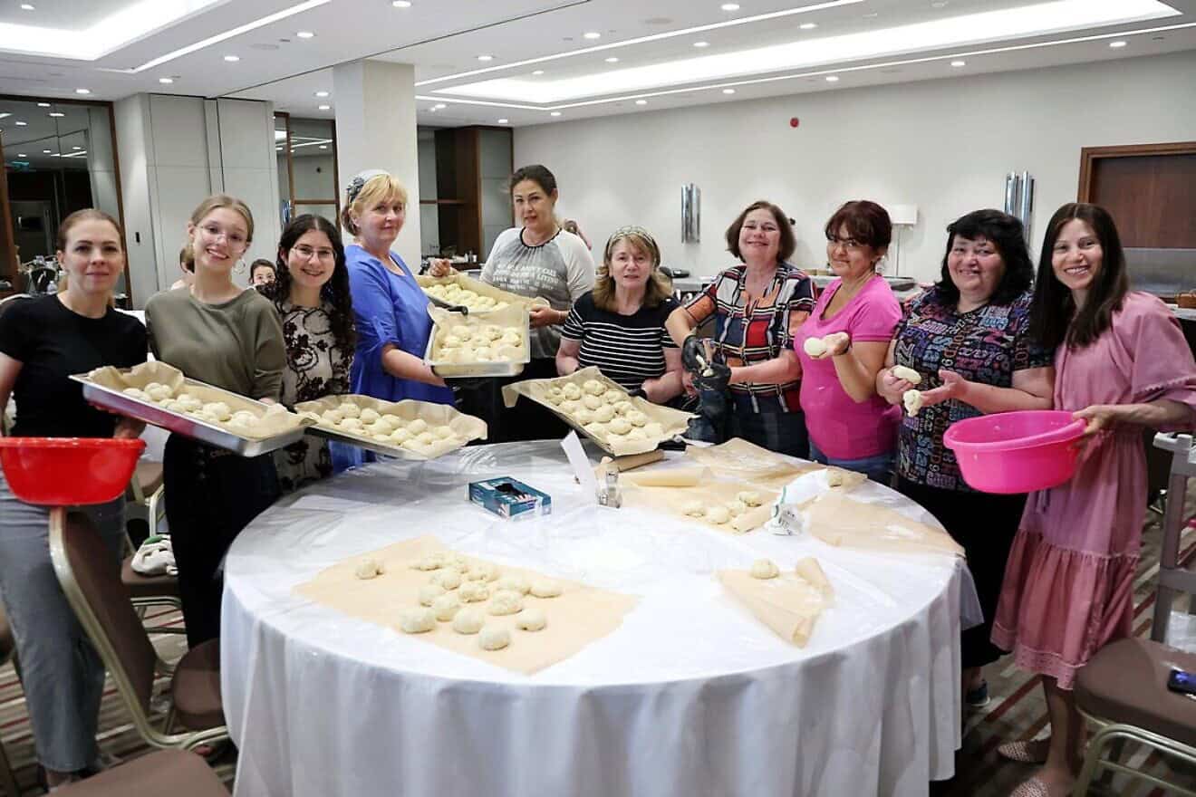 Women baked challah during a summer experience in Poland for 200 Jewish Ukrainians from Aug. 15-27, 2024. Credit: R. Vilenskyi/Chabad of Poland.