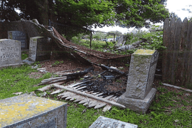 Damage to a fence and Jewish tombstone at the Workmen’s Circle Cemetery in Melrose, Mass., Aug. 20, 2024. Credit: Melrose Police Department.