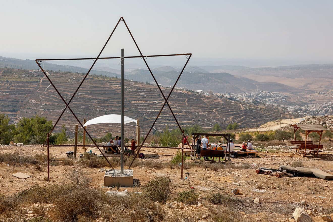 Israelis celebrate Sukkot on the outskirts of Neve Daniel in Gush Etzion, Oct. 11, 2022. Photo by Gershon Elinson/Flash90.
