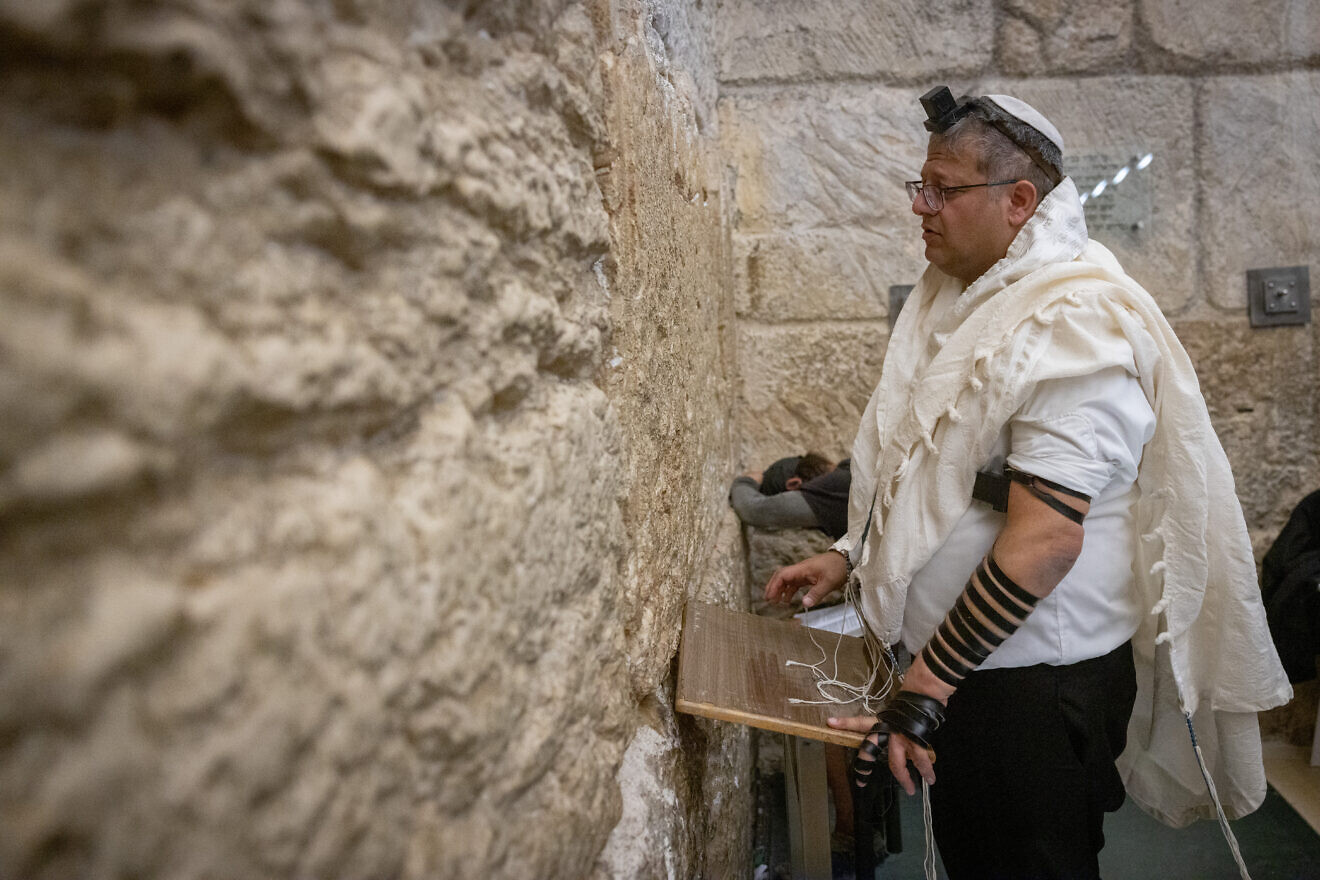 Israeli National Security Minister Itamar Ben-Gvir prays at the Western Wall in Jerusalem's Old City, after his visit at the Temple Mount, July 18, 2024. Photo by Chaim Goldberg/Flash90.