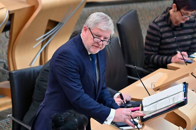Constitution Secretary Angus Robertson speaking during Portfolio Questions in the Scottish Parliament, in Edinburgh, Scotland, June 26, 2024. Photo by Ken Jack/Getty Images.