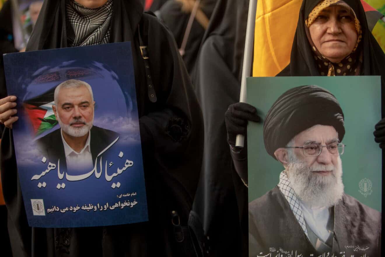 Iranians take part in a demonstration against the killing of Hamas chief Ismail Haniyeh in Tehran, July 31, 2024. Photo by Majid Saeedi/Getty Images.