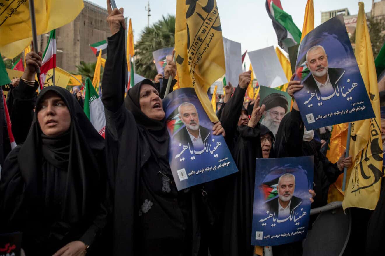 Hundreds of Iranians take part in a protest against the killing of Hamas terrorist leader Ismail Haniyeh in Tehran, on July 31, 2024. Photo by Majid Saeedi/Getty Images.